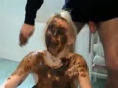Nasty bitch eating shit while sucking cock